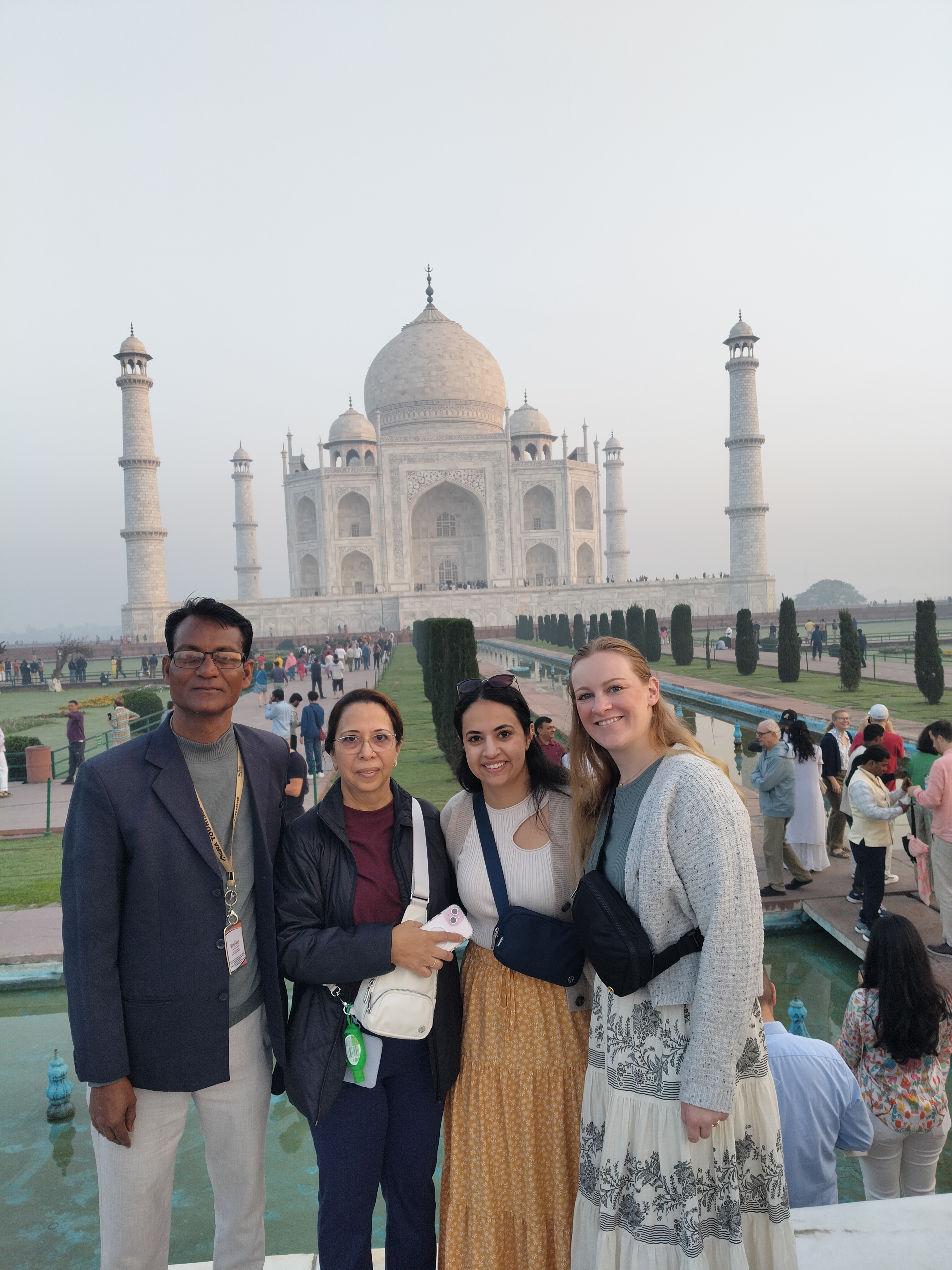 Mr. Verma with tourists smiling